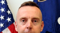 An Army general brought back from Afghanistan to face court-martial on a series of sexual misconduct charges deferred entering a plea Tuesday.